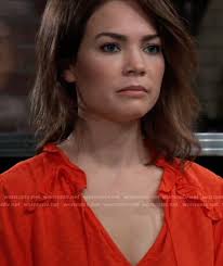 WornOnTV: Elizabeth's red dot jacquard top