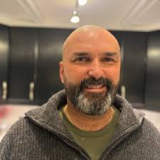 Is it normal for a Harley-Davidson key fob to work 100 miles away?