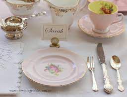 Tea party centerpiece ideas include in teapots, decorative tea cups, tea tins, and tea leaves. Setting The Table Place Settings The Vintage Table