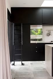 Ladder bookcase with cabinet, hartleys 4 tier white wooden ladder shelf bookcase display unit bamboo shelves 5051990758551 ebay. This Kitchen Has A Rolling Ladder To Reach The Upper Cabinets