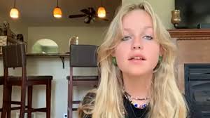 Family of college student killed by stray bullet in park sue city, school