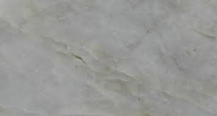 The island inverts this motif with a maple countertop and white cabinets below. A Deep Dive Into The Properties Of Quartzite Use Natural Stone