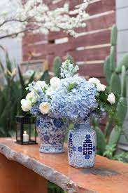 17.25'' h x 10'' w x 10'' d. Romantic Floral Arrangements In Ginger Jars