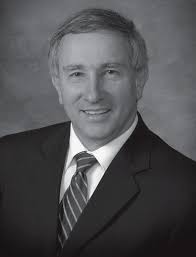 Leader of school district will retire next June