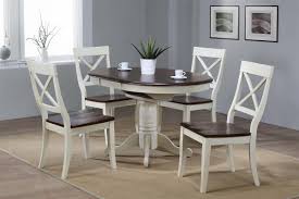 Dining tables are usually rectangular but this doesn't mean that a round table for example can't be as functional and practical as the usual ones. 36 X 36 Opens To 48 Solid Wood Round Table With Four Chairs