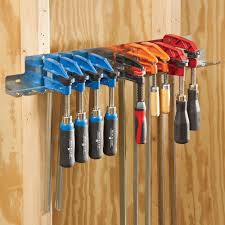 You may have noticed this wall of bessey quick clamps in the background of some of my workshop photos. F Style Clamp Rack Rockler Woodworking Tools