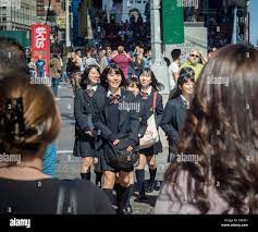 Group of Japanese schoolgirls in uniform in Times Square in New York on  Friday, October 3, 2014. (© Richard B. Levine Stock Photo 