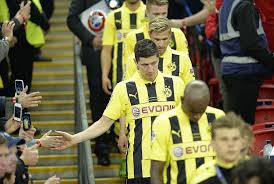 Who will make life difficult in germany. A Fan Shakes Hands With Borussia Dortmund S Polish Striker Robert Lewandowski R After His Team Lost The Uefa Champions Borussia Dortmund Dortmund Shake Hands