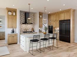 The best craftsman kitchens have stunning cabinetry made of real wood rather than this amazing craftsman style kitchen features beautiful woodwork a blue furniture style island a decorative wood hood a paneled refrigerator and white. Kitchen Bath Cabinet Collections American Woodmark Cabinets