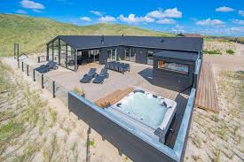 Fantastisches Ferienhaus In Der Ersten Dunenreihe Mit Sauna Und Aussenwhirlpool Esmark In 2020 Ferienhaus Ferien Ferienhaus Am See