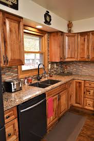 Get free shipping on qualified hickory kitchen cabinets or buy online pick up in store today in the kitchen department. Bailey S Cabinets Haas Signature Collection Rustic Hickory Pecan Finish Villa Door Style Hickory Kitchen Hickory Kitchen Cabinets Kitchen Remodel Small