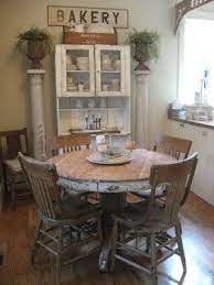 Wide natural wood farmhouse style round dining table. Pin By Jane Rogers On Favorite Places Spaces Farmhouse Dining Home Home Decor