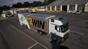 A long strip of crumpled metal that used to be the roof of a moving truck is now hanging from the rear of the vehicle. Solar Panels On Roofs And Sides Of Semi Trailers How Much Can You Save Trans Info