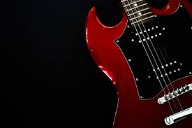 Get the gear you need today with our 0% financing options. Red Electric Guitar Closeup On Black Background 2465209 Stock Photo At Vecteezy