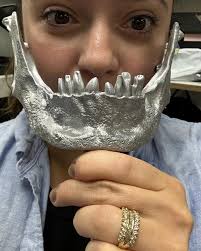 ☠️ Spooky Friday the 13th. We got ourselves a skull mask made in Aluminum.  Used the customers file to print, cast, then give it a spru tumble and  finished with 2 brass teeth. 💀