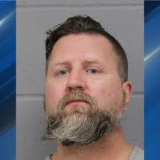 Man found dead after being arrested for pointing gun at bartender in NW  Austin