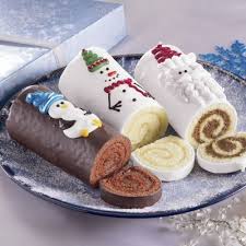 Cake With Butter Creme Topping Rolled And Covered With Chocolate Love The Hand Decoration Kaker Julekaker