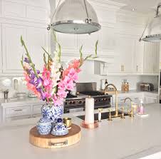The seagrass serving tray on this kitchen island is an excellent piece to incorporate in a lot of different styles of decor. Kitchen Island Decor 7 Simple Tips The Zhush