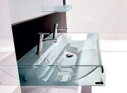 A bathroom sink can be a focal point of any bathroom, as it's often one of the first things you see when you walk in. 10 Stylish Designer Glass Sinks Glass Sink Glass Bathroom Bathroom Design Inspiration