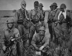 Japanese soldiers in Mongolia Area, China, 1939, with a captured Soviet DP machine gun.