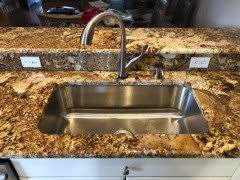 Learn the pros and cons of this popular sink type and whether it works best for your this stainless steel undermount sink is attached to a solid surface formica countertop. Potential Problems With Undermount Kitchen Sink