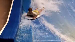 Sexy flowrider is demonstrating her downblouse in aqua park - watch on  VoyeurHit.com. The world of free voyeur video, spy video and hidden cameras