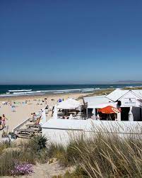 The Best Beaches Near Lisbon Costa Da Caparica Wishing On A Waterfall Beach Lisbon Beautiful Beaches