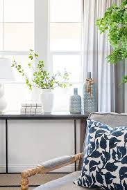 In a large living room it is better to add additional furniture or seating, (eg games table or writing desk) rather than increasing the. Console Table Under Window Design Ideas