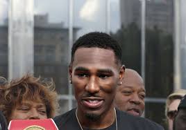 Thousands turn out to honor native son turned champ