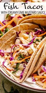 Add in the fact that i serve them in but, the fish tacos are healthier, and i love the addition of the creamy lime sauce with cilantro. Fish Tacos With Creamy Lime Mustard Sauce Soft Tacos Recipes Homemade Slaw Fish Tacos