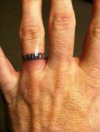 Pin By Lisa Strohmaier On Rings Wedding Ring Tattoo For Men Ring Tattoo For Men Wedding Band Tattoo