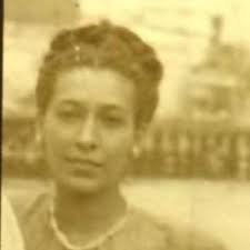 My mother age 12 weeks being held by her mother in May 1934. "1934 A  Century Of Progress" along the borders of the print.