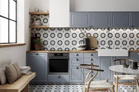 A modern kitchen island in chrome or painted in a deeper or contrasting colour to the wall cabinets will make it a focal point in a grey kitchen. Kitchen Wall Tiles Ideas For Every Style And Budget Loveproperty Com