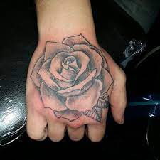 In general a rose tattoo is associated what does a rose tattoo mean on a guy s hand. Rose On Hand Tattoo Idea Best Tattoo Design Ideas Rose Tattoos For Men Hand Tattoos For Guys Hand Tattoos For Women