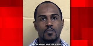 Man arrested for being a felon in possession of a firearm at Jolie  Apartments