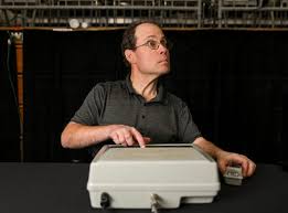 The sultan of scorekeeping, Grant Buehler makes it look easy