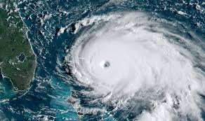 Hurricane Dorian Batters The Bahamas Before Barreling Along