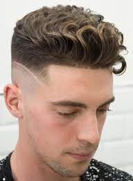 The mid fade looks great on the sides and back, and the unique blending is super modern and short. 40 Hairstyles For Men With Wavy Hair