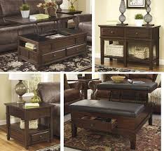 The gately ottoman coffee table from ashley furniture homestore (afhs.com). Signature Design By Ashley Gately T845csoce 4 Piece Living Room Table Set With Lift Top Cocktail Table Console Sofa Table Ottoman Cocktail Table And End Table In Medium Brown Finish Appliances Connection