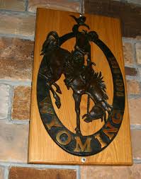 One of the best known bucking horses of all time, steamboat was known as the horse that couldn't be ridden. there has been a great deal of dispute as to the image of the man on the bucking horse. Wyoming S Registered Trademark Bucking Horse And Rider