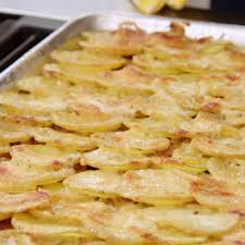 In a saucepan, heat up the cream with the bay leaves, thyme, garlic, nutmeg and some salt and pepper. Food Network Canada How To Make Valerie S Sheet Pan Scalloped Potatoes Facebook