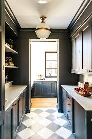 This kitchen was small and it didn't help that it had a tiny, barely usable breakfast nook just off to the left. Benjamin Moore Wrought Iron Best Dark Cabinet Paint Color Benjamin Moore Wrought Iron Works We Benjamin Moore Wrought Iron Kitchen Design Closed Kitchen Design