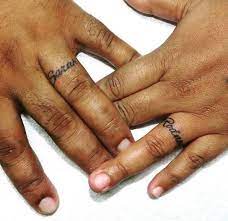 Modern wedding ring finger tattoo design tattoomagz. Wedding Ring Tattoo Best Creative Option For Couples