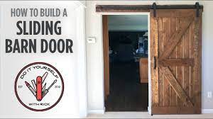Diy Sliding Barn Door Youtube Diy Barn Door Hardware Barn Door Designs Sliding Barn Door