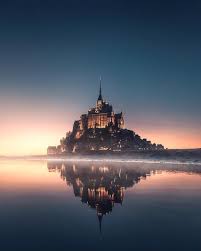 When Real Life Looks Like A Disney Movie Mont Saint Michel Reflections In France Photo By Visualsofjulius Explore Sha Travel Photography Travel Spot Travel