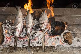 Find a delicious and easy fish recipe here that your whole family will love. Cooking Fish Grilled Over Hot Coals Bonfire Stock Photo Picture And Royalty Free Image Image 31753488