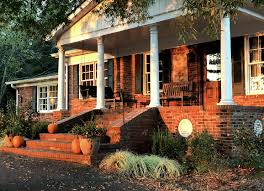 The examples shown in the picture are windows, columns, and rails. 12 Of The Best Paint Colors To Go With Red Brick Laurel Home