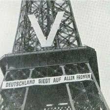 The Eiffel Tower during the Nazi occupation during the World War 2,1940.  (Translation - Deutchland Siegt Auf Allen Fronten - “Germany is victorious  on all fronts” )