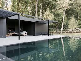 The sunken mezzanine of this pool house has a central concrete fireplace, and separates the 2. Pin On Owl S Nest