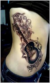 25 Creative Guitar Tattoo Designs Guitar Tattoo Design Music Tattoo Designs Tattoo Designs For Women